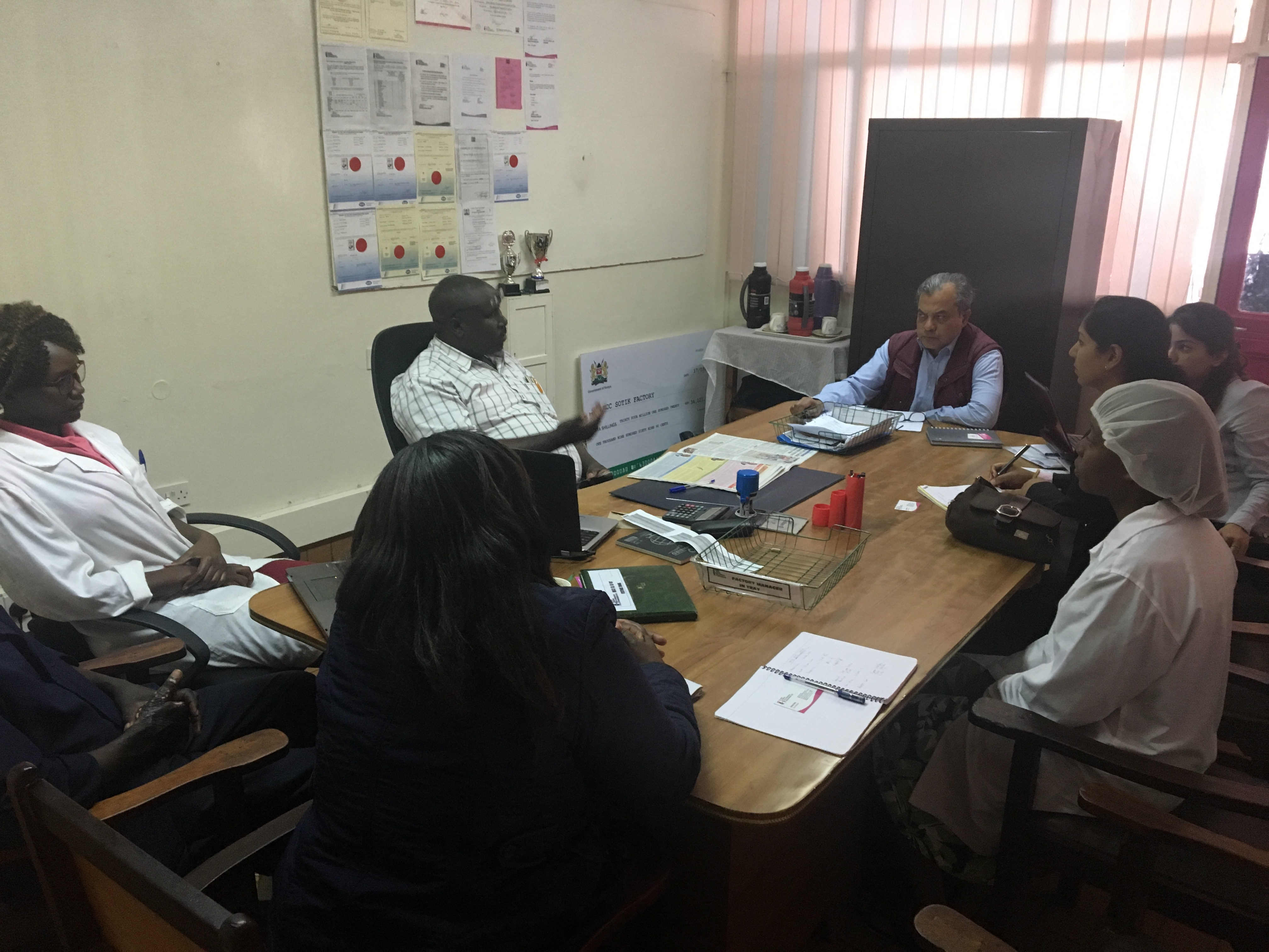 Closing meeting with factory management at a client site in Kenya